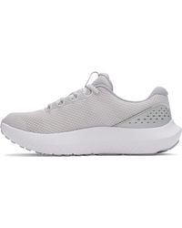 Under Armour - UA W Charged Surge 4 - Lyst