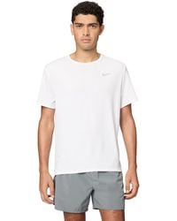 Nike - Miler Uv Hardlooptop Met Korte Mouwen En Dri-Fit Voor - Lyst