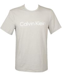 Calvin Klein - CK NM2264E T-shirt à manches courtes et col rond avec logo imprimé sur le devant pour homme - Lyst