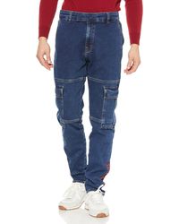 HUGO - 634/2 Blaue Tapered-Fit Jeans aus Knit Denim Blau 34/34 - Lyst