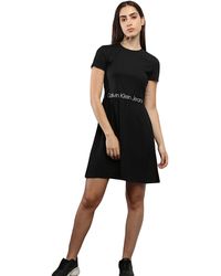 Calvin Klein - Dress with logo taping - Size - Lyst