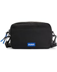 HUGO - Vytal R Crossbody Reporter-Tasche mit Logo-Aufnäher und abnehmbarem Riemen Schwarz001 Stck - Lyst