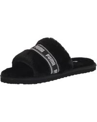 PUMA Slippers for Women - Up to 67% off at Lyst.com