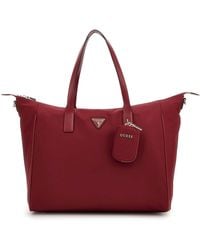 Guess - Reistas Met Laptopvak Follie Carryon Large Tote Rust Red Donkerrood - Lyst