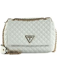 Guess - Rainee Quilt Convertible Xbody Flap Bag White - Lyst