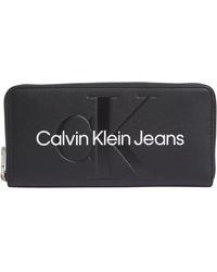 Calvin Klein - SCULPTED ZIP AROUND MONO - Lyst