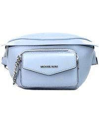 Michael Kors - Maisie Large Pebbled Leather 2-in-1 Sling Waist Pack In Pale Blue - Lyst