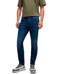 HUGO - 634 Tapered Jeans - Lyst