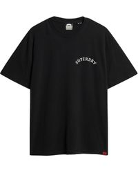 Superdry - Locker geschnittenes T-Shirt mit Tattoo-Grafik Verwaschenes Schwarz XXXL - Lyst