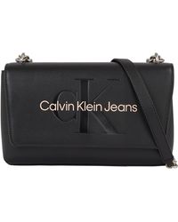 Calvin Klein - Jeans Tasche Sculpted Flap Mono Klein - Lyst