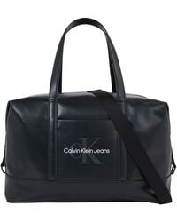 Calvin Klein - Jeans Duffle Bag Monogram Soft Hand Luggage - Lyst