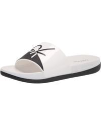 Calvin Klein Slippers for Women - Up to 38% off at Lyst.com