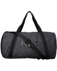 PUMA - At Ess Barrel Bag Elektro Summ Black - Lyst