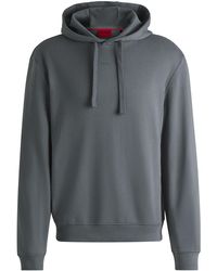 HUGO - Relaxed-Fit Hoodie Aus Baumwoll-Terry Mit Logo-Print - Lyst
