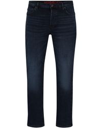 HUGO - Tapered-fit Jeans In Blue-black Denim - Lyst