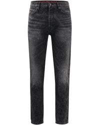 HUGO - 634 Schwarze Tapered-Fit Jeans aus festem Denim Dunkelgrau 33/32 - Lyst