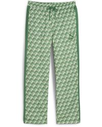 PUMA - Pantalon de survêtement T7 M Archive Green AOP - Lyst