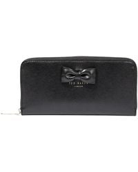 Ted Baker - Wxl-beyla Bow Black Bow Detail Zip Around Purse/wallet - Lyst