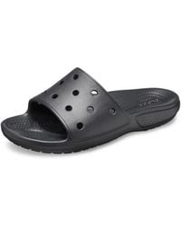Crocs™ - Classic Slide – Unisex Sandalen für Erwachsene – Bequeme Schuhe für den Strand – Schwarz – Größe 39-40 - Lyst