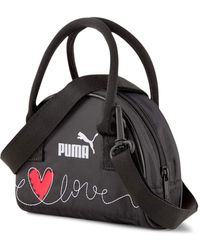 PUMA - Handtasche Valentines Mini Grip Bag COR 078232 Black One Size - Lyst