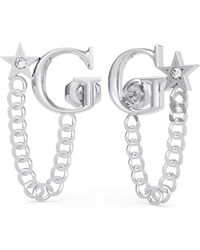 Guess - Boucles d'oreilles femme UBE70156 argentées avec logo - Lyst