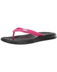 womens pink nike flip flops