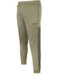 dark green adidas tracksuit mens