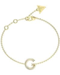 Guess - Bracciale da donna collezione G Crystal. Bracciale realizzata in acciaio e di colore oro giallo. Misure: 12 mm. La referenza è: - Lyst