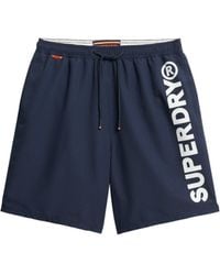 Superdry - 43,2 cm Sport-Badeshorts mit Grafik Marineblau M - Lyst