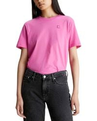 Calvin Klein - Ck Embro Badge Regular Tee S/s Knit Tops Pink - Lyst