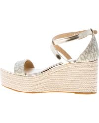 Zeppe oro michael kors hot sale