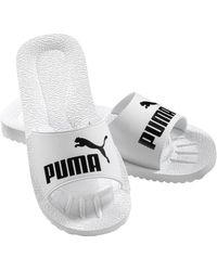 PUMA - Slides PURECAT unisexes pour adulte - Lyst