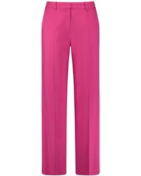 Gerry Weber - Elegante Hose mit Bügelfalten unifarben reguläre Länge Solar Pink 38 - Lyst