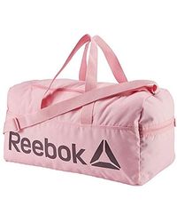 bolsa reebok dorados