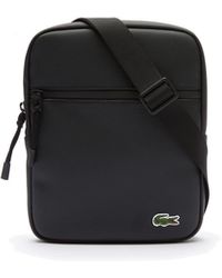 Bolsos Lacoste de hombre: hasta el 42 % de descuento | Lyst