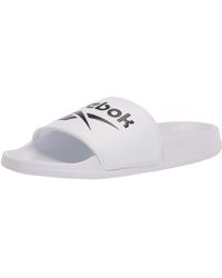 Reebok Flip-flops and slides for Women - Up to 5% off at Lyst.com