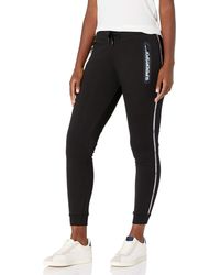 Superdry Track pants and sweatpants for Women - Up to 58% off at Lyst.com