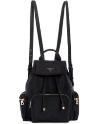 Guess - Bolsos y carteras para - Lyst