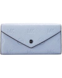 Michael Kors - Jet Set Travel Large Logo Embossed Leather Envelope Wallet - Lyst