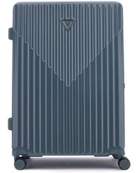 Guess - Valise Centennial 28 in 8-Wheeler Exp. Slate Bleu Gris - Lyst