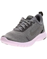 nike training flex trainers in grey with peach swoosh