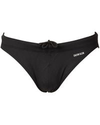 Calvin Klein - Badehose CK Swimming Pool mit Logo hinter Gummizug und verdecktem Kordelzug an der Taille Artikel ZM0ZM02304 Slip - Lyst