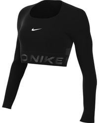 Nike - Top da donna Pro Dri-Fit Cropped a maniche lunghe - Lyst