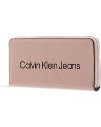 Calvin Klein - CKJ Sculpted Zip Around Mono Wallet Dark Blush - Lyst