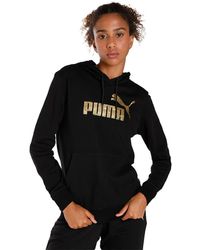 PUMA - Hoodie avec Logo en métal Essentials+ XS Black Gold - Lyst