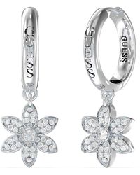 Guess - Orecchini da donna della collezione Loto bianco. Gli orecchini di 30mm hanno come simbolo fiore ed hanno misura: taglia unica. - Lyst