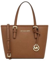 Michael Kors - Michael Jet Set Travel Xs Carryall Cnv Tz Tote In Luggage - Lyst