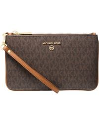Michael Kors - Jet Set Charm Medium Top Zip Wristlet Brown/acorn One Size - Lyst