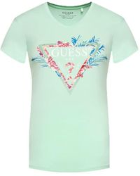 Guess - T-shirt d'été à manches courtes pour femme en coton bleu clair avec imprimé L - Lyst
