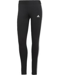 adidas - Jogging con bolsillos laterales y logo - Lyst